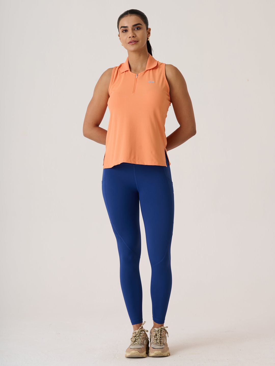 Women Serve Tennis Polo
- MutedOrange
