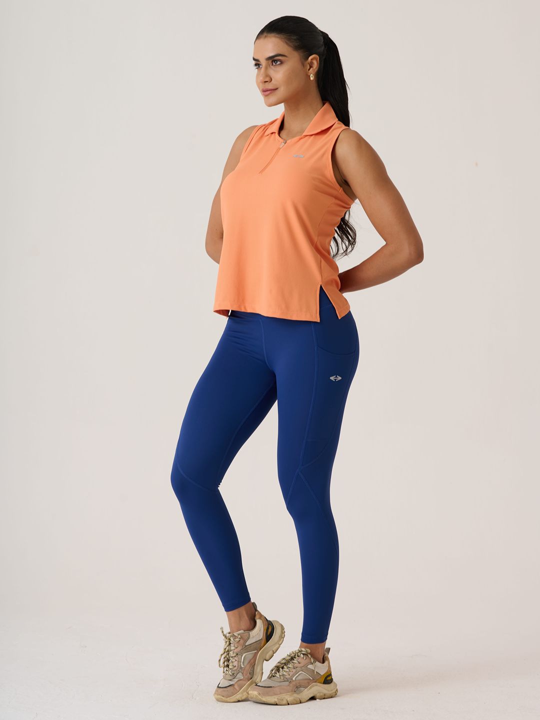 Women Serve Tennis Polo
- MutedOrange