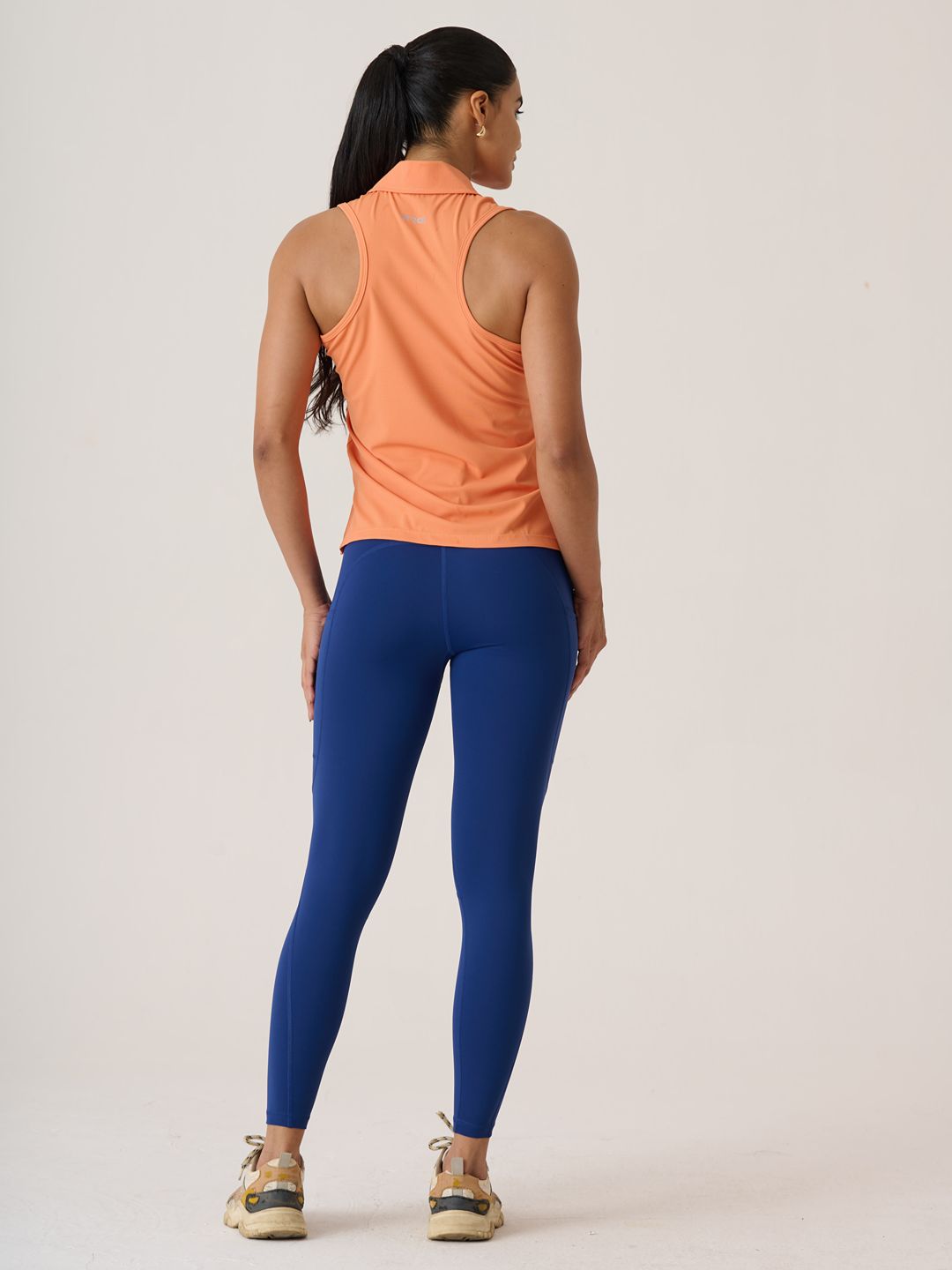 Women Serve Tennis Polo
- MutedOrange