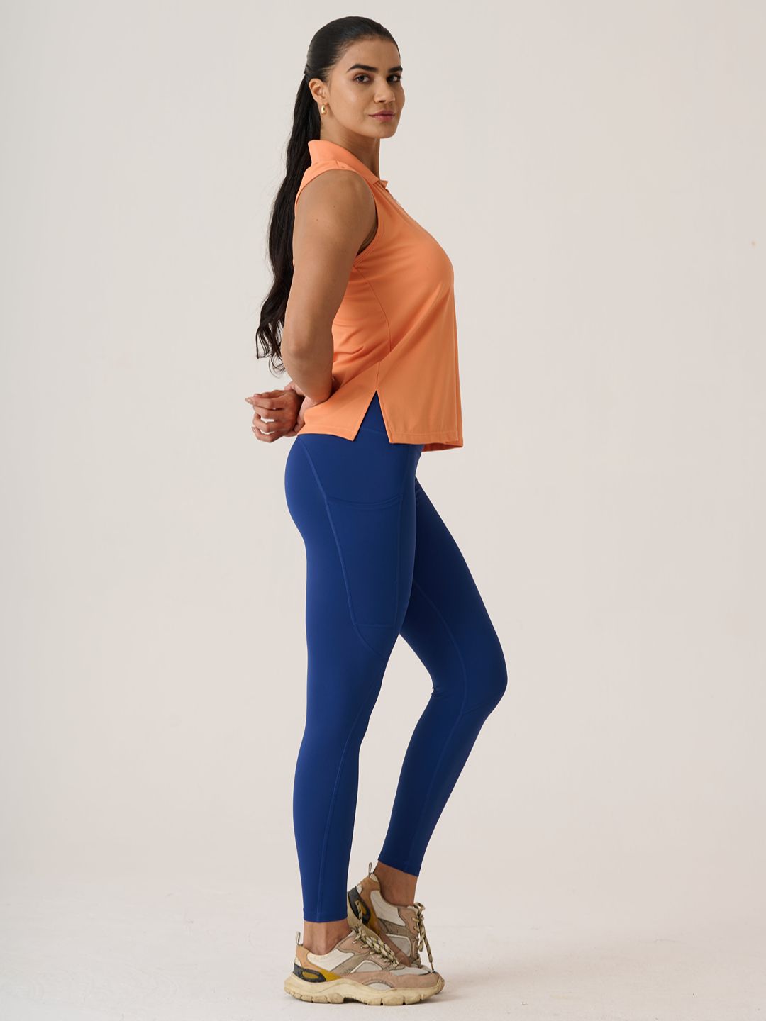 Women Serve Tennis Polo
- MutedOrange