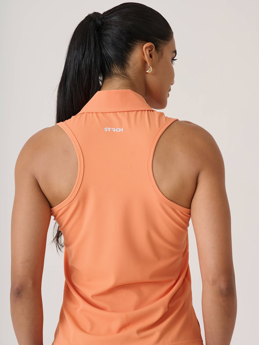 Women Serve Tennis Polo
- MutedOrange
