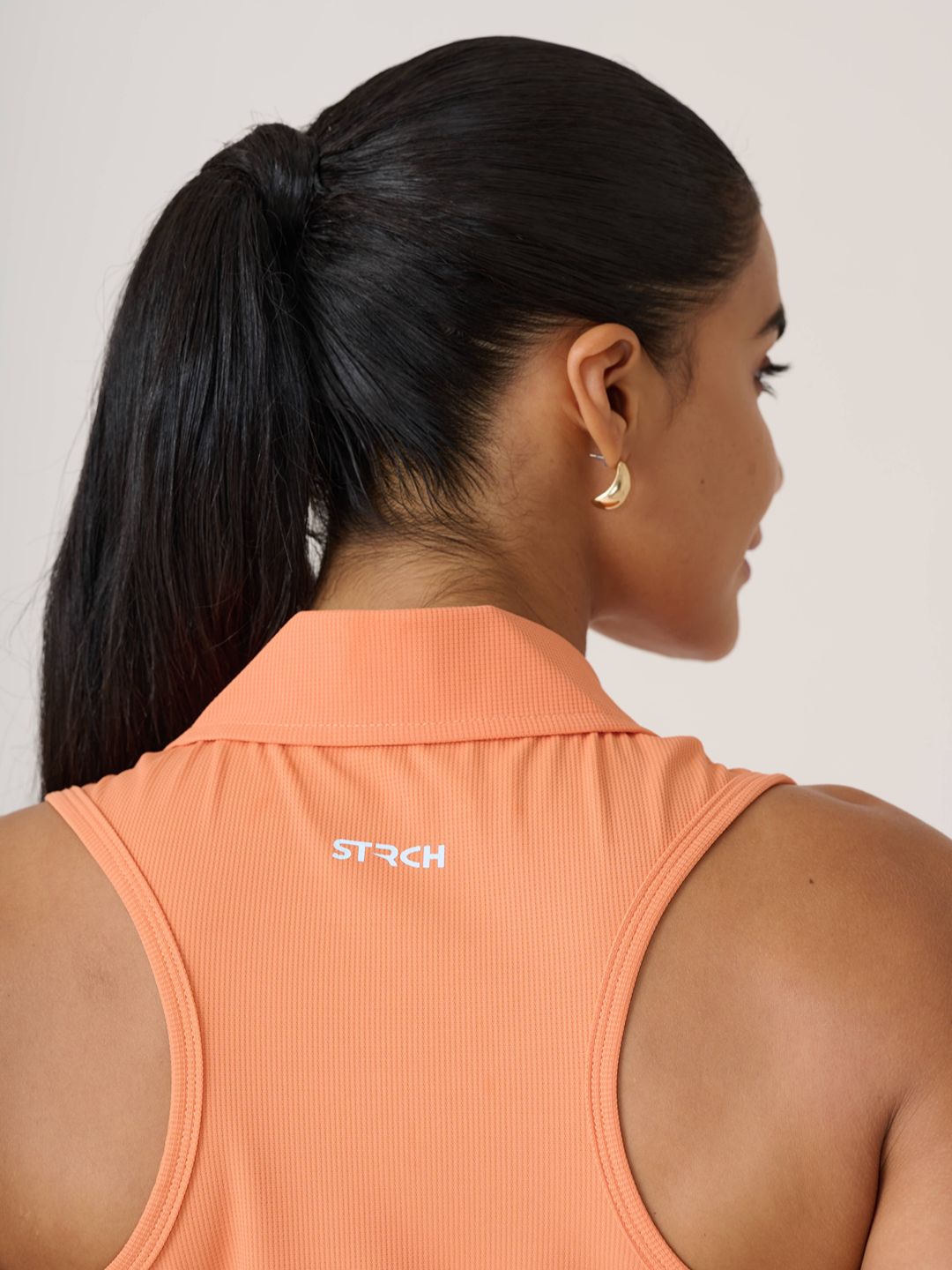 Women Serve Tennis Polo
- MutedOrange