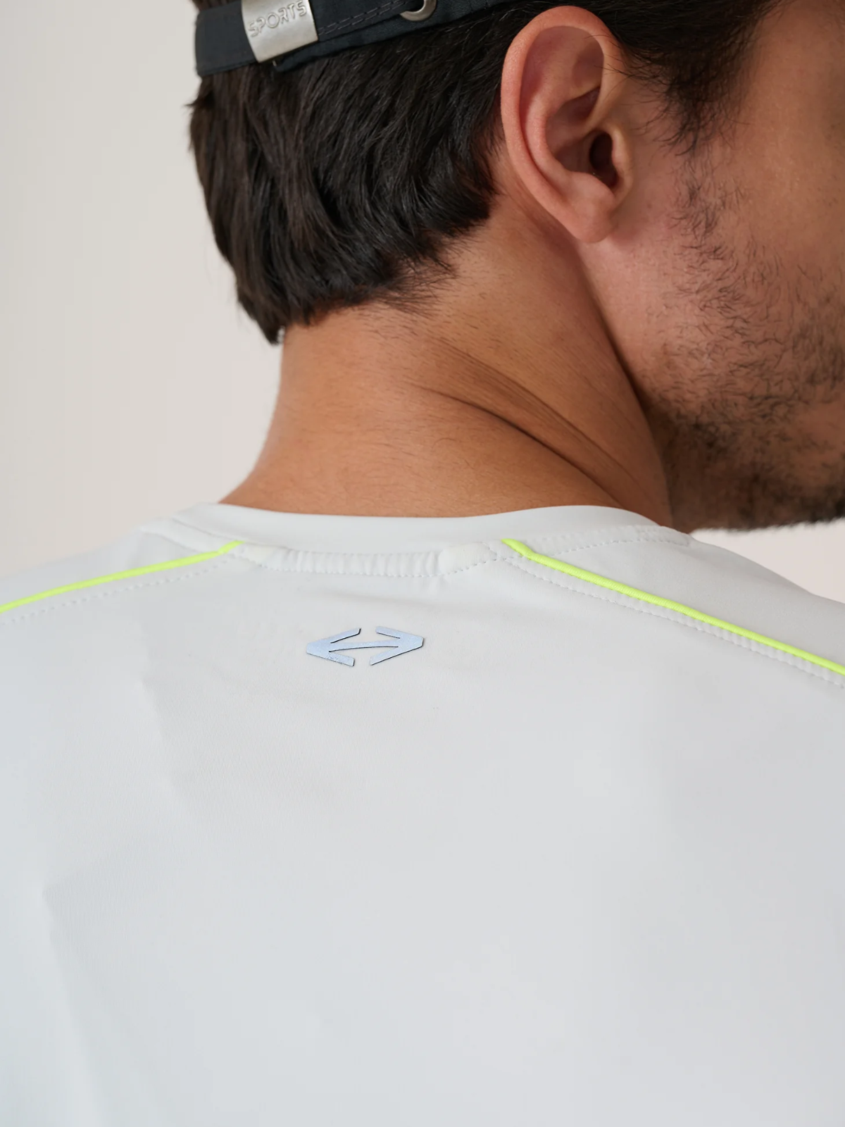 Reflective back logo on the STRCH Foggy Dew tee